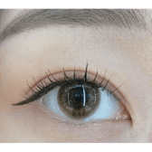 Olens Marry Me Orange Brown — single-eye close-up showing the contact lens appearance
