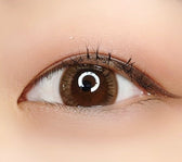 Olens Monet Brown Toric colored contact lens, 13.4mm graphic diameter, 3-6 Months wear