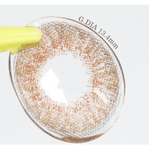 LensVery My Ann Something Brown — contact lens held with tweezers