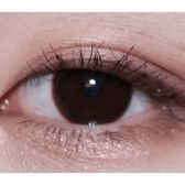 Olens It's Choco — single-eye close-up showing the contact lens appearance