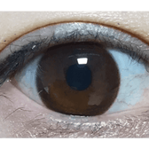 Olens It's Choco — single-eye close-up showing the contact lens appearance