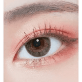 LensTown New Vanilla Candy Berry — single-eye close-up showing the contact lens appearance