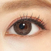 LensTown New Vanilla Candy Green — single-eye close-up showing the contact lens appearance