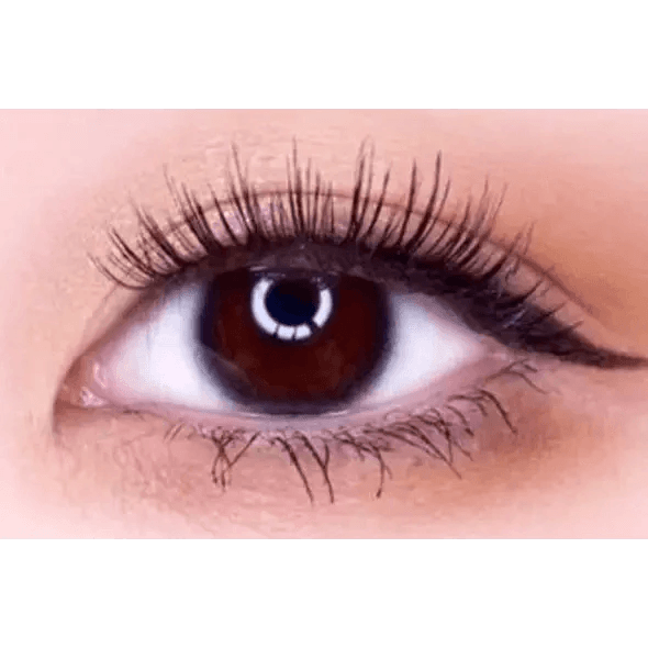 LensTown Nudy Coco Black — single-eye close-up showing the contact lens appearance