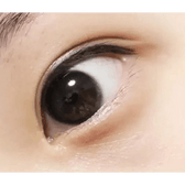 LensTown Nudy Coco Black — single-eye close-up showing the contact lens appearance