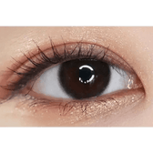 LensTown Nudy Coco Black Toric — single-eye close-up showing the contact lens appearance