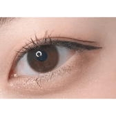 LensTown Nudy Coco Brown (10p) — single-eye close-up showing the contact lens appearance