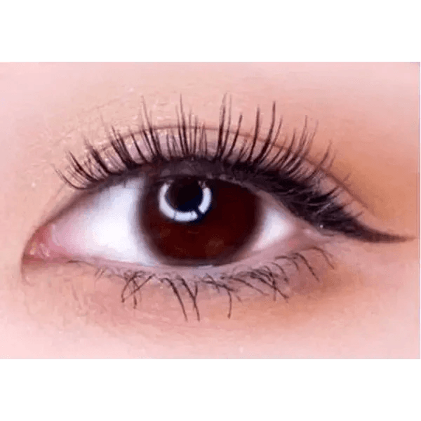 LensTown Nudy Coco Brown — single-eye close-up showing the contact lens appearance