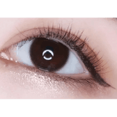 LensTown Nudy Coco Brown Toric — single-eye close-up showing the contact lens appearance