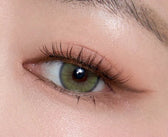 Olens Nella Ash Olive colored contact lens, 13.3mm graphic diameter, Monthly wear