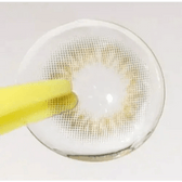 Olens Scandi Gray — contact lens held with tweezers