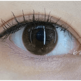 Olens ShineB Brown — single-eye close-up showing the contact lens appearance