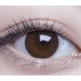 Olens ShineB Brown — single-eye close-up showing the contact lens appearance