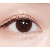 Olens Shining Pure Choco — single-eye close-up showing the contact lens appearance