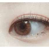 Olens Someday Brown — single-eye close-up showing the contact lens appearance