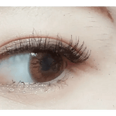 Olens Someday Brown — single-eye close-up showing the contact lens appearance