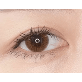 Olens Someday Choco — single-eye close-up showing the contact lens appearance