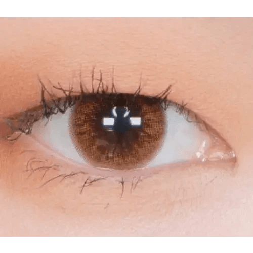 Olens Someday Choco — single-eye close-up showing the contact lens appearance
