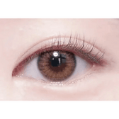 Olens Spanish Brown (20p) — single-eye close-up showing the contact lens appearance