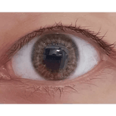 Olens Spanish Real Brown — single-eye close-up showing the contact lens appearance