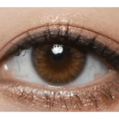 Olens Spanish Real Brown — single-eye close-up showing the contact lens appearance