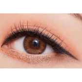 Olens Spanish Real Brown — single-eye close-up showing the contact lens appearance