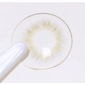 Olens Spanish Real Gray — contact lens held with tweezers