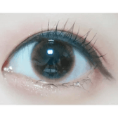 Olens Spring Rain Brown — single-eye close-up showing the contact lens appearance