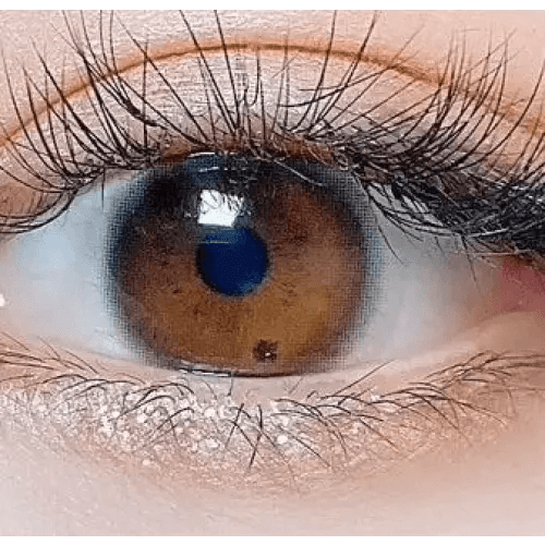 Olens Stay Black — single-eye close-up showing the contact lens appearance