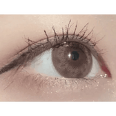 Olens Tika Chocolate Brown — single-eye close-up showing the contact lens appearance