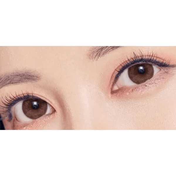 Olens Tika Chocolate Brown — both eyes wearing the contact lenses