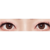Olens Tika Chocolate Brown — both eyes wearing the contact lenses
