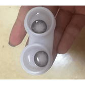 Olens Tok Tok Sugar Gray — contact lenses displayed in storage cases