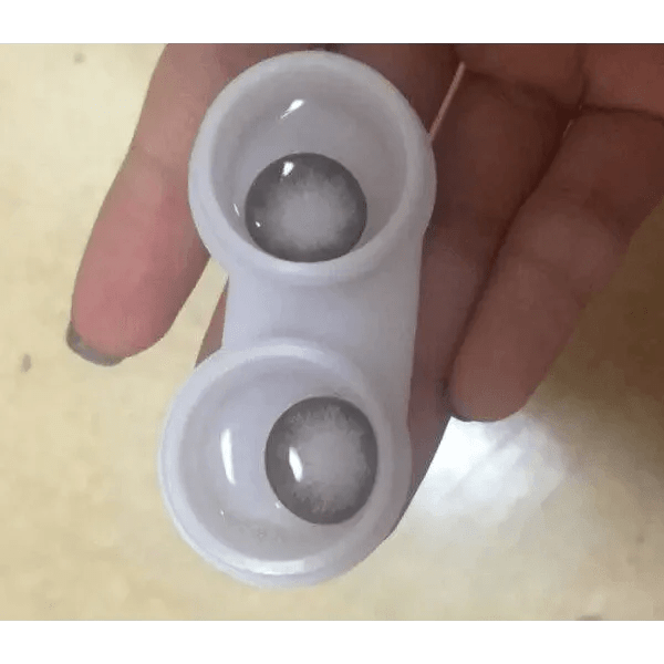 Olens Tok Tok Sugar Gray — contact lenses displayed in storage cases