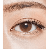 Olens TT 1 Brown — single-eye close-up showing the contact lens appearance