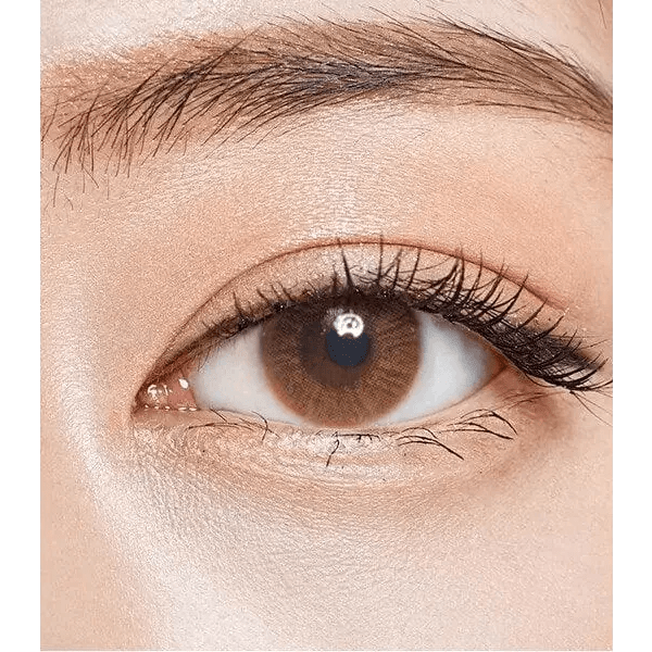 Olens TT 1 Brown — single-eye close-up showing the contact lens appearance