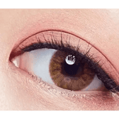 Olens Vogue Brown — single-eye close-up showing the contact lens appearance