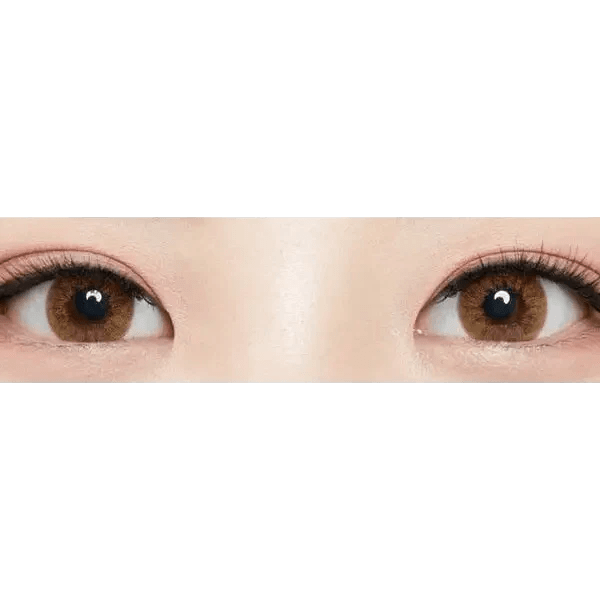 Olens Vogue Brown — both eyes wearing the contact lenses