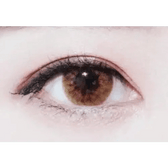 Olens Vogue Brown — single-eye close-up showing the contact lens appearance