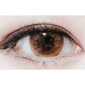 Olens Vogue Brown — single-eye close-up showing the contact lens appearance