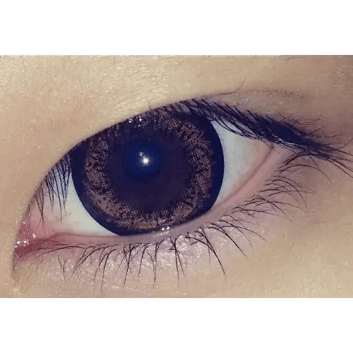 Olens W3 Brown — single-eye close-up showing the contact lens appearance