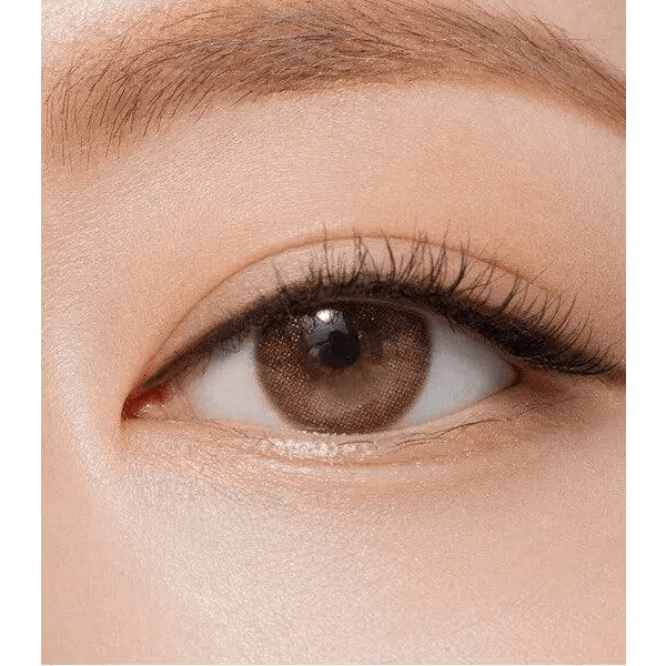 Olens Pearl Day Gold Brown — single-eye close-up showing the contact lens appearance