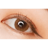 LensTown Pocopong Brown — single-eye close-up showing the contact lens appearance