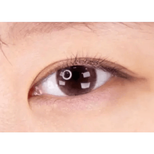 LensTown Pocopong Pink — single-eye close-up showing the contact lens appearance