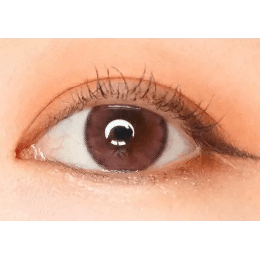 LensTown Pocopong Pink — single-eye close-up showing the contact lens appearance