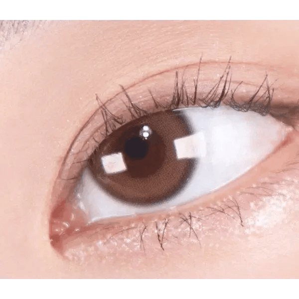 Olens Real Ring 1Day Brown (20p) — single-eye close-up showing the contact lens appearance