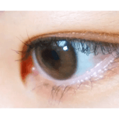 LensVery Rich Ann Indie Brown (6p) — single-eye close-up showing the contact lens appearance