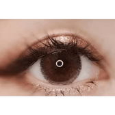 Olens Rich Brown — single-eye close-up showing the contact lens appearance
