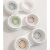 Olens Rich Brown — contact lenses displayed in storage cases