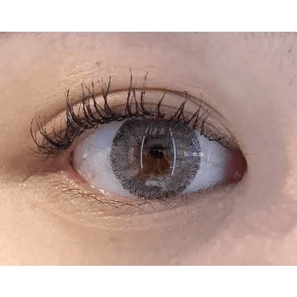 Olens Rich Gray — single-eye close-up showing the contact lens appearance